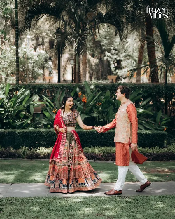 A candid, walking shot of the couple in the beautiful gardens of the ITC Maratha. I love capturing these natural, in-between moments.