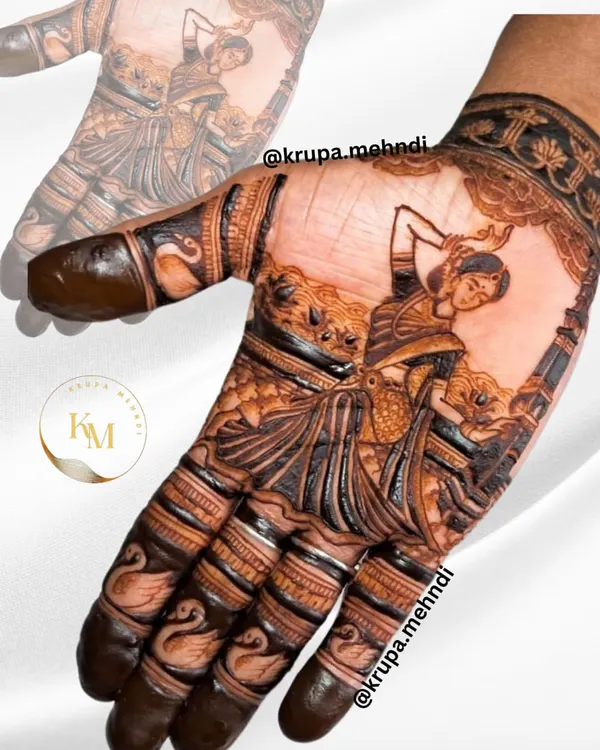 A traditional yet trendy design featuring a classical dancer figure. This is a beautiful way to celebrate our culture through mehndi art.