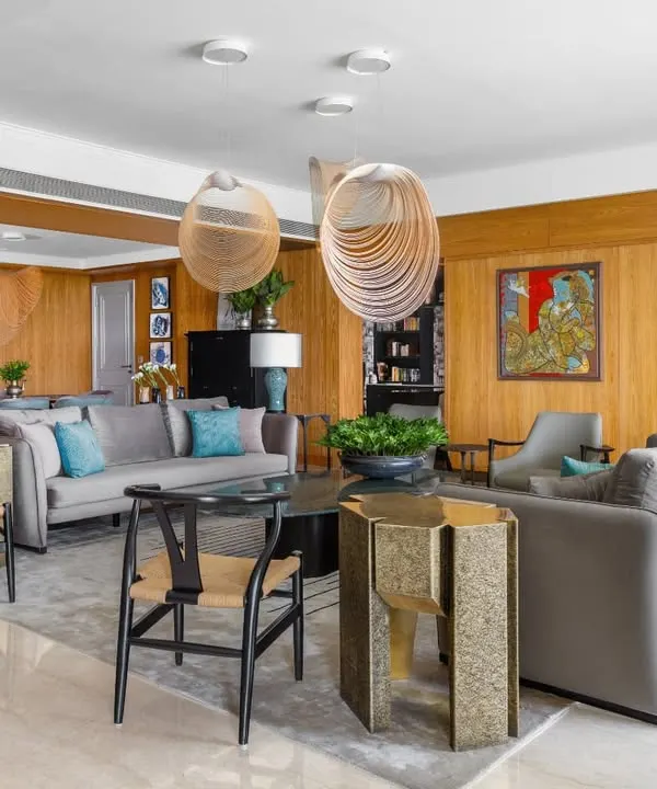 The Magnolia project is a curated experience where every object tells a story. This open-plan living and dining area balances function and beauty, from the inviting sofas and armchairs to the artistic coffee tables from my Koko collection. The magnificent chandelier and elegant dining setting complete the narrative.