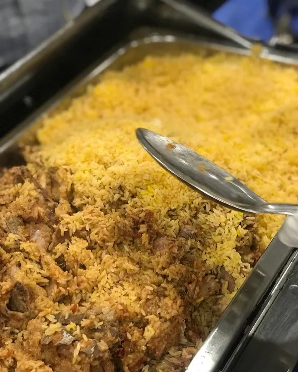 A close-up of our succulent Mutton Biryani, a crowd favorite at the Salaam Souk event. Each grain of rice is infused with flavor, and the mutton is cooked until perfectly tender.