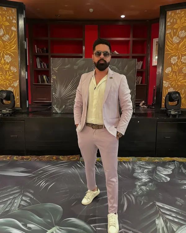 Dressed for success at the Taj Mahal Palace hotel. My work is my passion, and I always aim for the top, both in my music and my style.