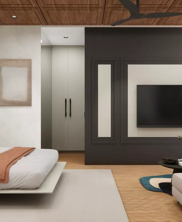This space was transformed from a family room into a smartly designed bedroom. A sleek Murphy bed tucks away when not in use, while a low couch and mounted TV create a soft divide between lounging and sleeping zones, showcasing a perfect multi-functional design.