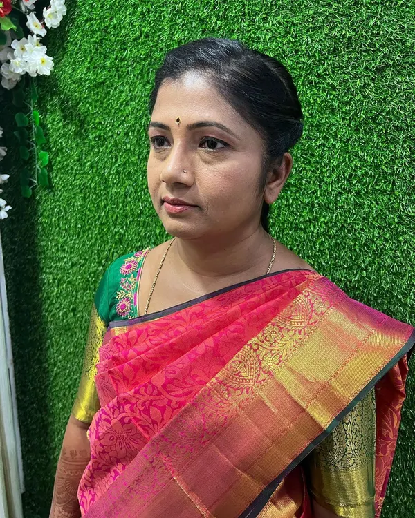 This is a perfect example of my simple and elegant makeup service. I used soft, neutral tones on the eyes and face to create a fresh and polished look for this client in a beautiful pink silk saree.
