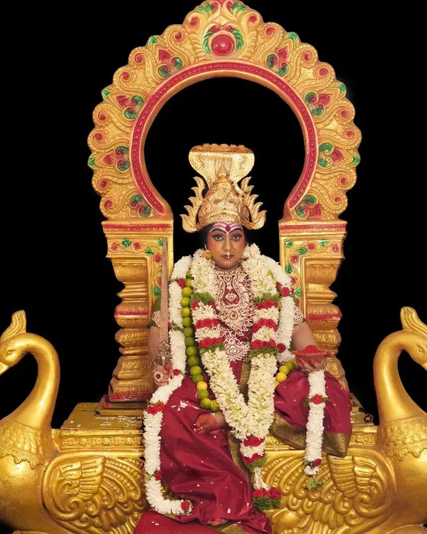 A full depiction of a goddess look, complete with an ornate throne and traditional attire. This type of character makeup is a key part of our fantasy module.