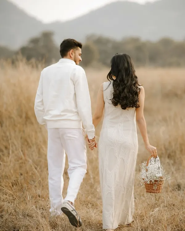 This is the beginning of a new chapter. I captured this moment for Sejal and Nikul in a quiet field in Lonavala as they walked hand in hand, dreaming of the future. It’s these unscripted, in-between moments that tell the most beautiful stories.