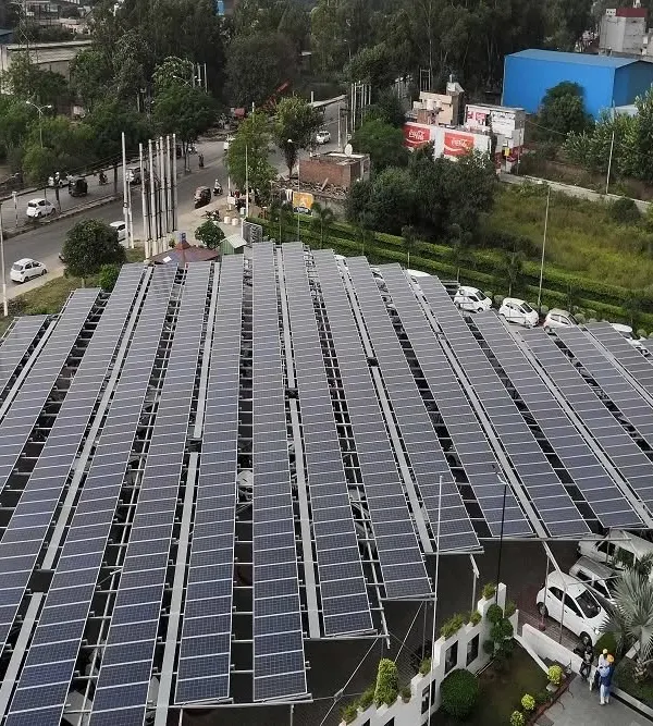 An aerial view of our solar carport installation for Fortis Hospital. This project demonstrates a smart use of space, generating clean power while providing shaded parking for vehicles, adding value beyond just energy production.