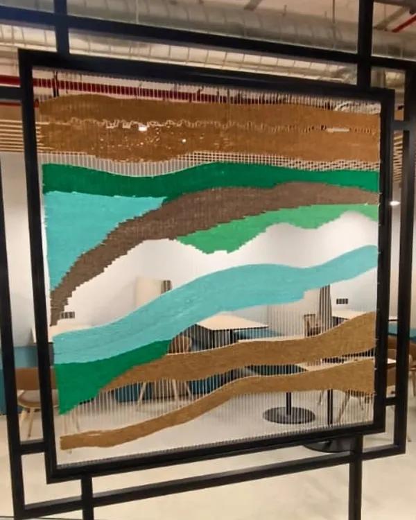 From murals to tapestries, I'm always exploring new mediums. This is a large-scale tapestry art installation I created as a space divider for a corporate office in Hyderabad.