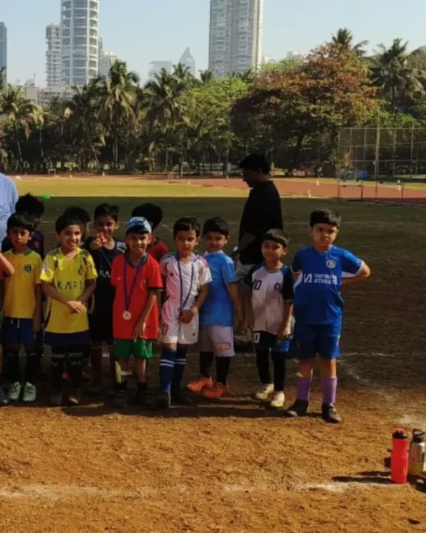 A team of our youngest players proudly stands with their medals after competing in the PDP Next Gen Football Tournament. We believe in celebrating participation and effort at every age.