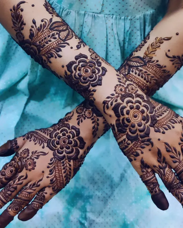 A bold and beautiful floral design. The dark, rich stain makes the flowers and leaves stand out dramatically.