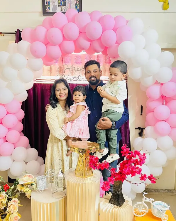 A complete family picture from my daughter Aarya's birthday celebration. My husband, my two kids, and me. My world in one frame.