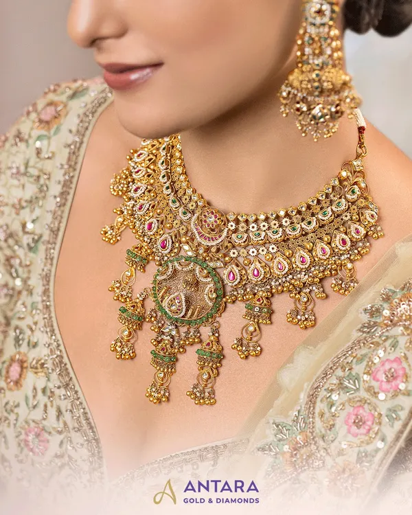 This exclusive 22kt gold bridal choker is the centerpiece of my bridal edit. It features a fine Kundan setting, traditional meenakari work, and signature jhumki drops, all crafted to frame the face with a serene, unforgettable radiance.
