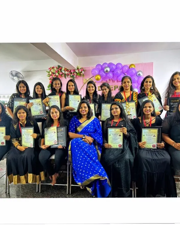A proud moment with my students at the end of a successful hairstyling course. Each student is holding their certificate of completion, ready to start their professional journey.