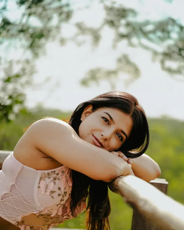 This dreamy, soft-focus portrait was shot outdoors to create a gentle and approachable feel. It's perfect for a creative professional or anyone looking for a personal branding image that feels warm and authentic.