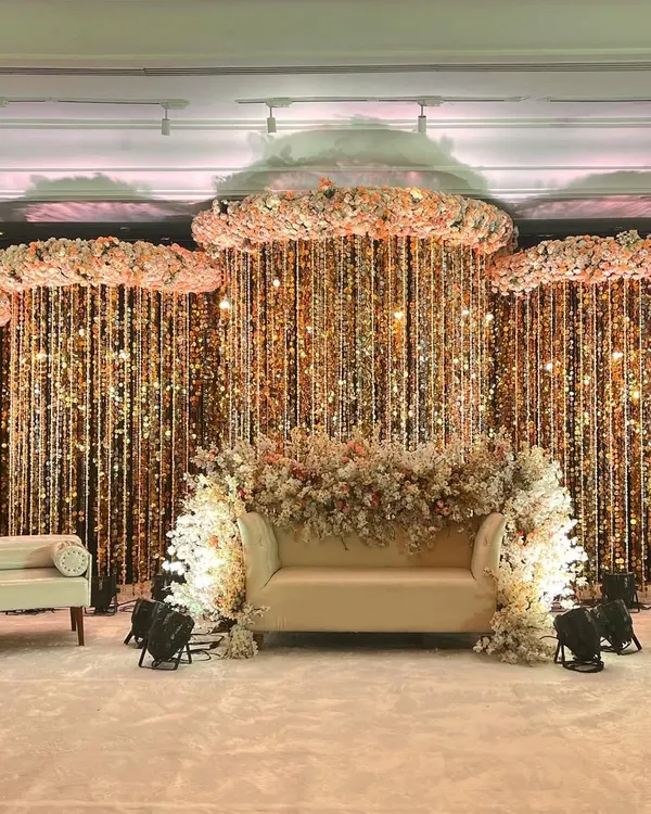This reception stage demonstrates how I use texture and light to create a luxurious focal point. Cascading crystal strings and floral clouds produce a shimmering, three-dimensional effect that looks stunning both in person and on camera for any corporate gala.