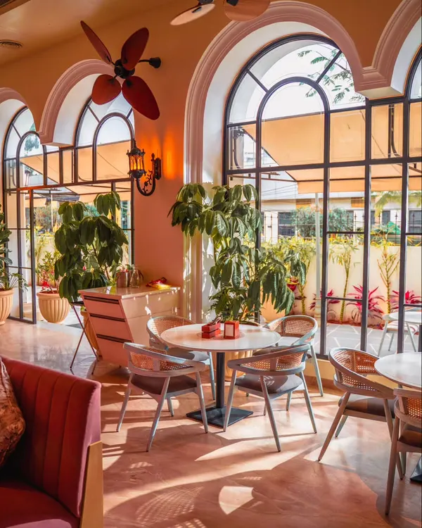 At my mansion, time slows down. Sunlight pours in through arched windows, casting a golden glow over cozy corners and intimate tables. Here, elegance meets ease, and every visit is a story waiting to be told.