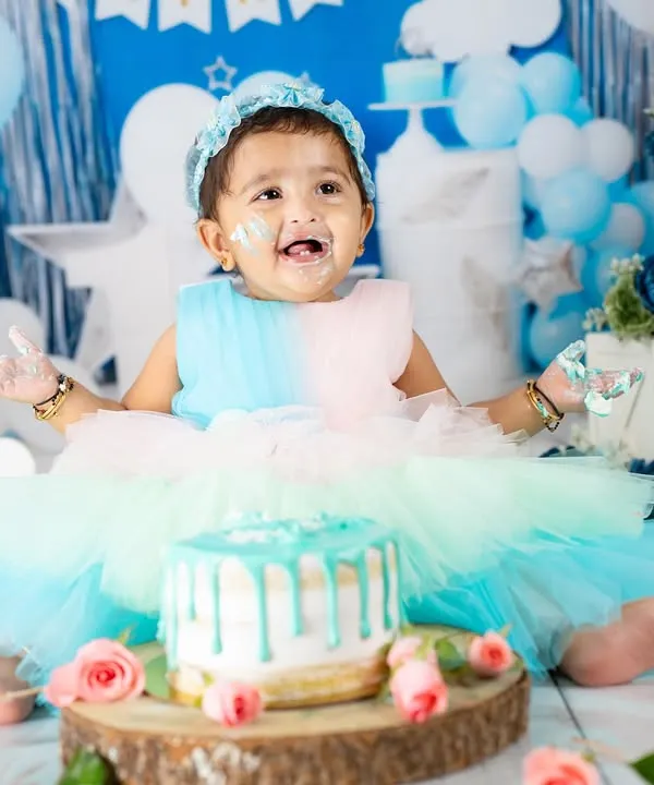 This is the pure, unfiltered joy I aim to capture. A first birthday cake smash is more than a photo; it's a memory of pure happiness, and I love creating a fun, messy, and beautiful setting for it.