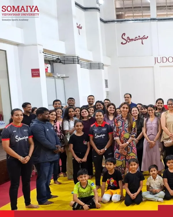 A group photo of young judo athletes, parents, and coaches at our Judo Excellence Centre during a Sports Fundamental Training Program.