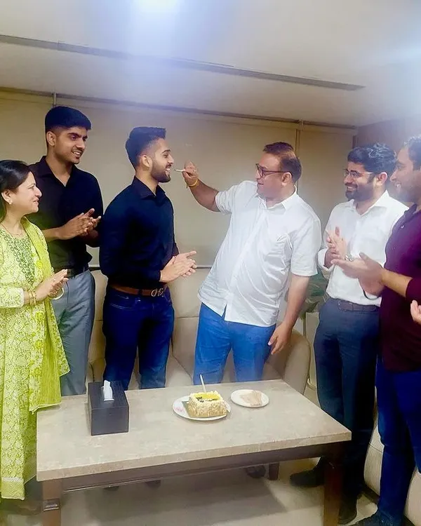 A lighthearted moment during a senior advocate's birthday celebration. This shows the respect and warmth we share within our team, from the most senior to the newest intern.