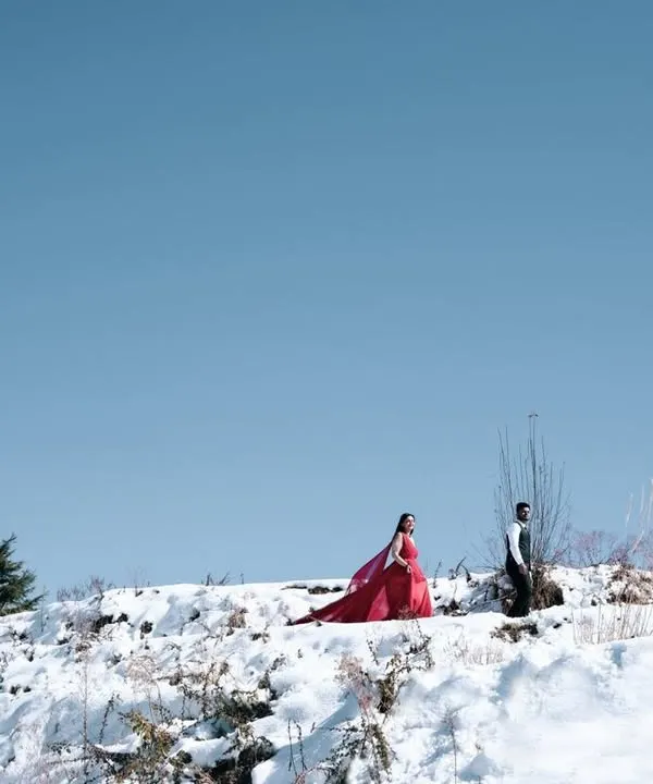 This is what it feels like when your love is the most vibrant thing in a world of white. For me, a pre-wedding shoot is about finding a landscape as grand as your journey and capturing a moment of pure, cinematic magic. This is more than a photo; it's a feeling.