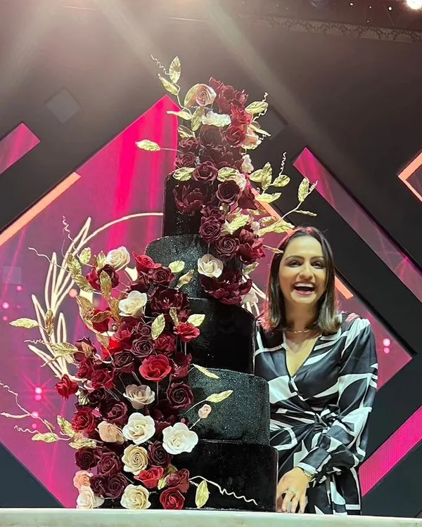 This is me, Neeth, with one of my proudest creations. From architect to patissier, my passion is creating stunning cakes that taste as good as they look.