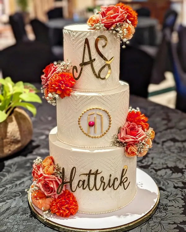 This 10kg, three-tiered showstopper was the centerpiece for a major felicitation event hosted by the Mumbai Cricket Association. Adorned with fresh flowers and custom gold monograms, it's an example of the grand cakes I can create and assemble on-site for your most important galas and functions.