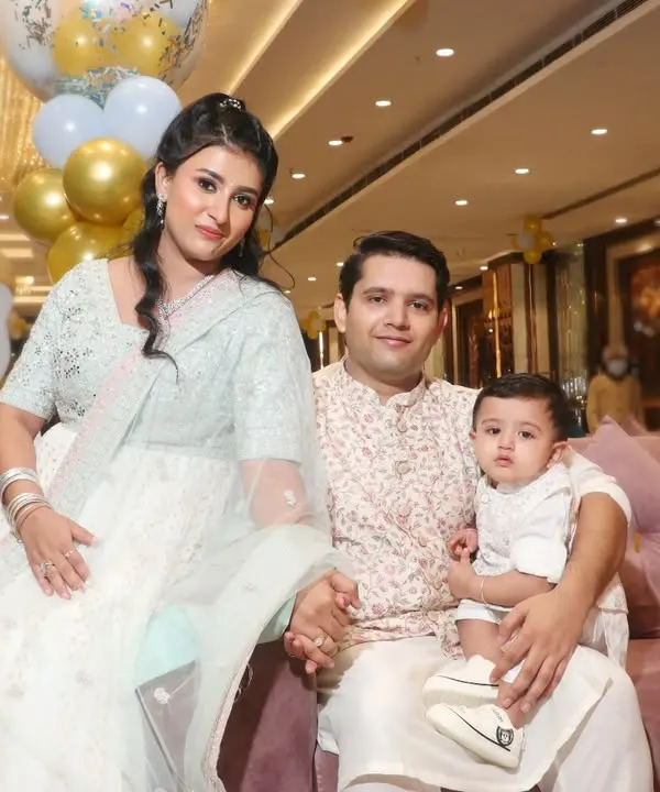 A beautifully dressed family poses for a portrait at an elegant evening event. We capture the style and atmosphere of your special gatherings.