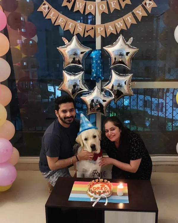 This is what a perfect family portrait looks like to us. We love being a part of your dog's first bark-day and all the ones that follow, with custom cakes that are as special as they are.