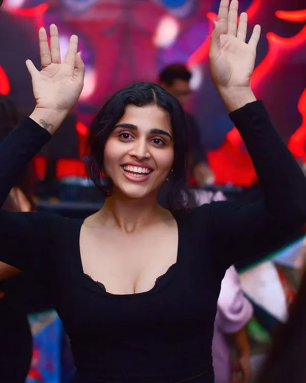 Hands up and all smiles. This is the energy I love to see on the dance floor during my Friday night sets at Tipsy Bull.