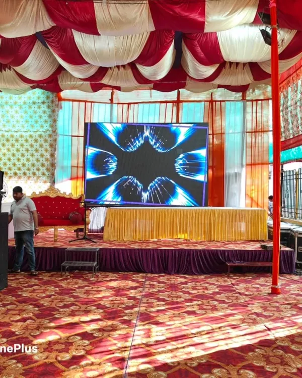 This is the kind of large-scale setup I can bring to your event. A massive LED screen for visuals, flanked by powerful speakers, ensures that every guest has a front-row experience, no matter the size of the venue.