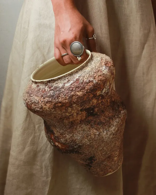 This large, sculptural vase is part of my '100 Explorations' project. Each piece is a conversation between my hands and the clay, embracing textures and forms that feel alive and born from the earth.