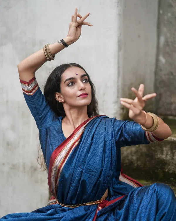 My background as a trained Bharatanatyam dancer deeply influences my understanding of yoga. The hand mudras and expressive movements are another language for connecting with the divine, reminding me that awareness, not the pose, is the goal.