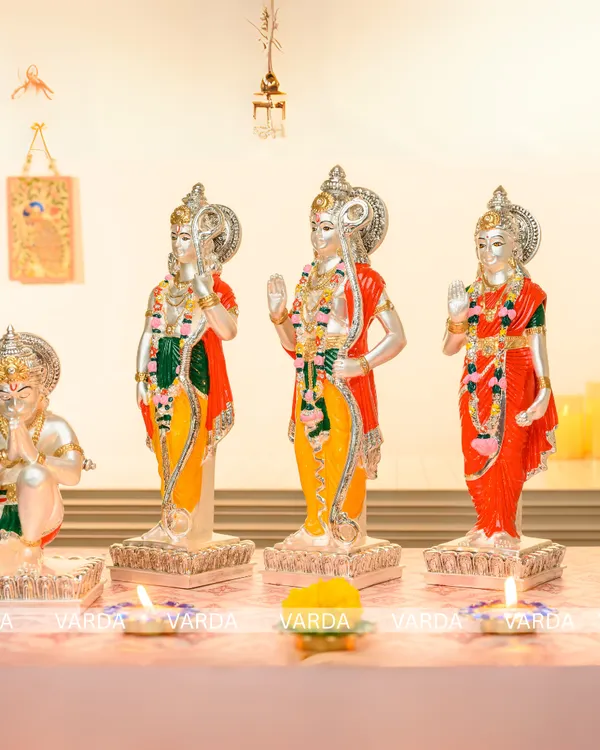 This beautiful Ram Darbar set includes silver-plated and hand-painted idols of Ram, Sita, Lakshman, and Hanuman. They are perfect as a centerpiece for a home puja or as a sacred wedding gift.