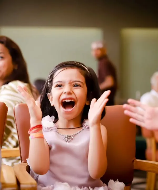 The pure excitement of a birthday party! We capture the candid reactions and joyful moments of kids enjoying the celebration.