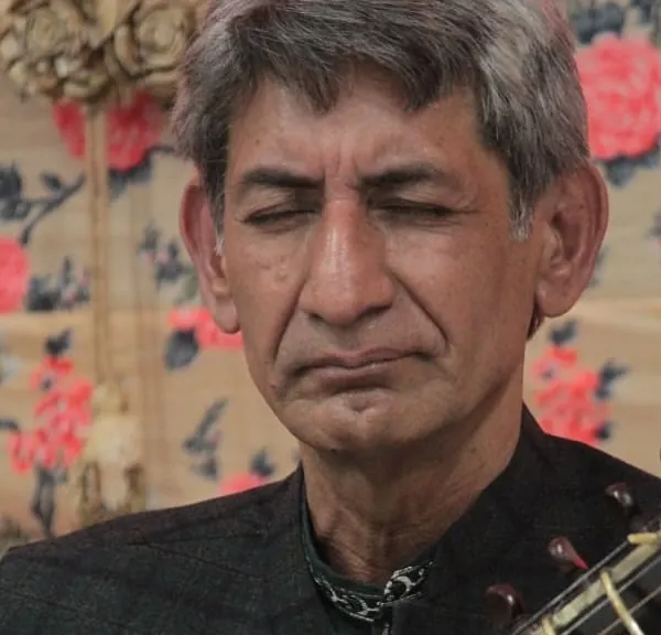 A moment of deep meditation from a Sitar recital during the 'Raghunathanjali' baithak, an event dedicated to musical reverence.
