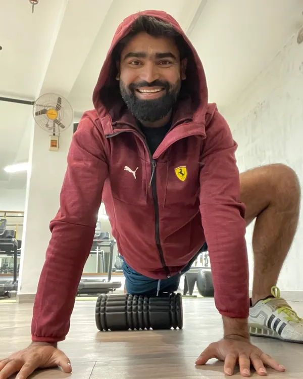 I always have work to do, and that includes recovery. Using a foam roller on my quads helps release muscle tension and improve flexibility after a tough leg workout.