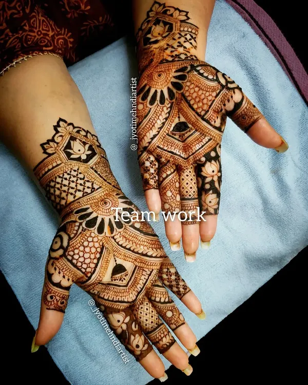 A great example of our teamwork. This intricate design was done for a large group booking, showcasing our ability to deliver consistent quality.