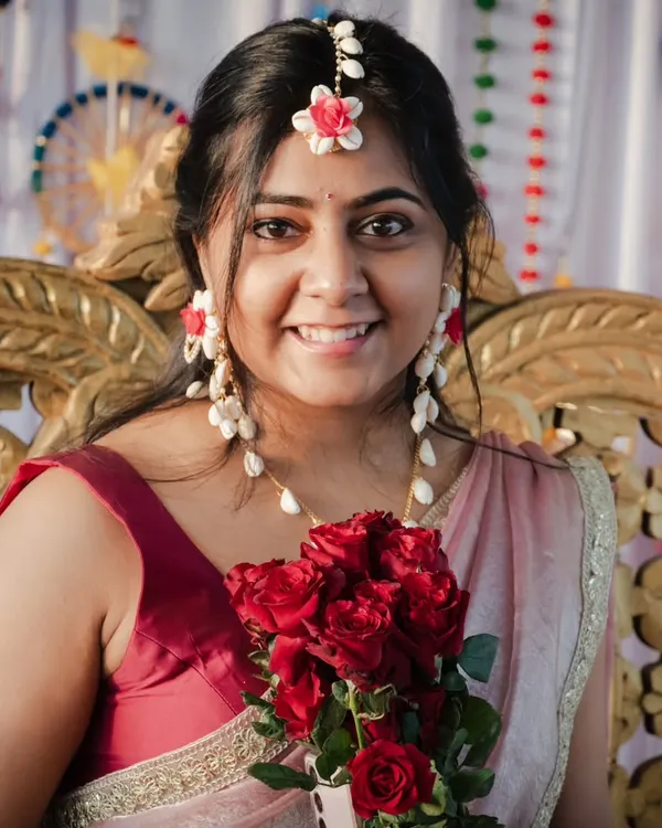 This is the kind of moment I live to capture. A beautiful, candid smile during a Haldi ceremony, filled with natural light and genuine happiness. It’s a timeless bridal portrait that you will cherish forever.