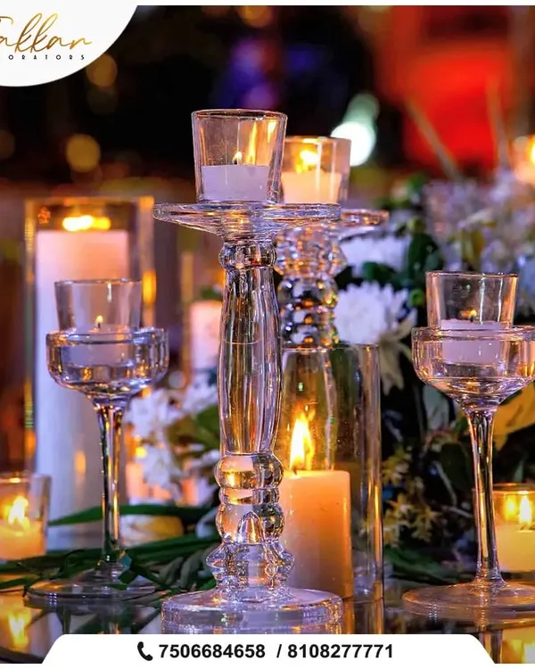 The soft glow of candlelight creates an unmatched romantic ambiance. I use a variety of crystal and glass candle holders to create beautiful, shimmering table centerpieces for evening events.