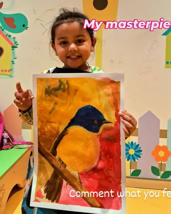 This is what pure joy looks like. We love seeing our young artists beam with pride after finishing their masterpieces. This vibrant bird was painted by one of our little students, who explored color mixing and brush techniques to bring her vision to life.