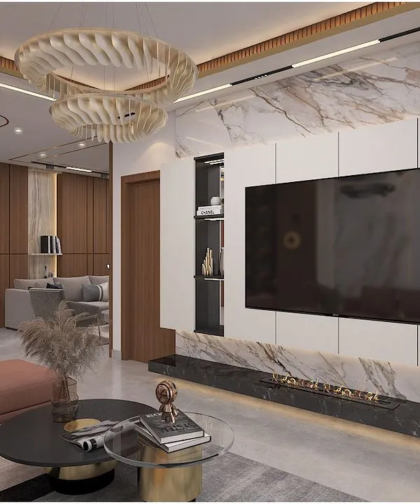 A luxurious living room concept featuring a stunning marble and wood-paneled TV wall with an integrated fireplace and a unique wavy chandelier.