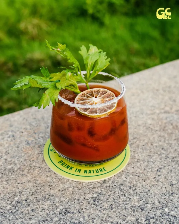 A classic Bloody Mary, bold and spicy, garnished with celery and a dehydrated lime wheel. The perfect brunch cocktail.