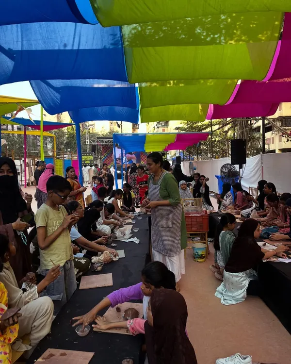 This was a wonderful 'Clay-in-Faces' workshop I conducted at the Govandi Arts Festival. It was beautiful to see the entire community come together under the colorful canopy to create.