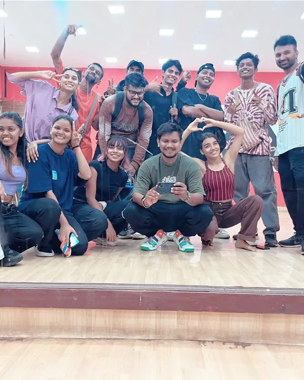 A happy team after a successful show. This group photo in our dance studio captures the energy and camaraderie of our talented choreographers and dancers.