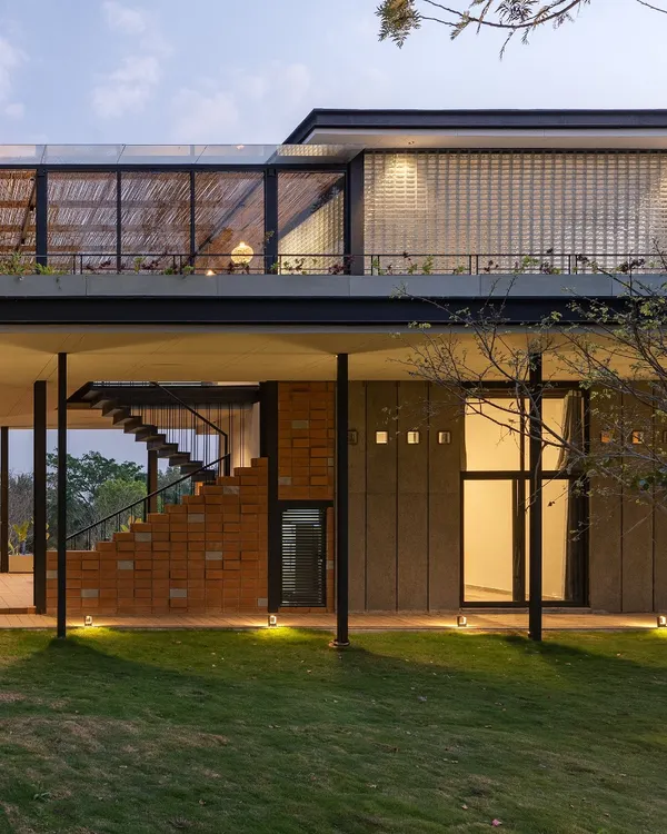 A detail from 'The Earth' project showing the combination of CSEB brick stairs, dry-clad granite walls, and glass blocks. This composition highlights our approach of using a varied but harmonious palette of sustainable materials.
