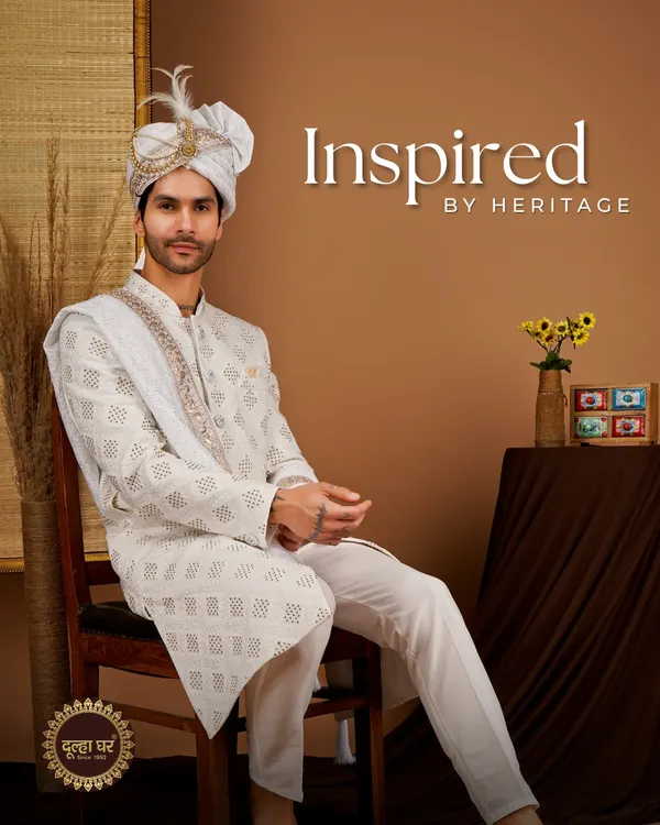 This is the quintessential royal groom look I strive to create. An all-white, intricately embroidered sherwani paired with a matching safa (turban) and stole, this ensemble is designed for the man who wants to look nothing less than majestic on his wedding day.
