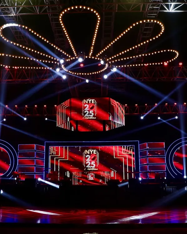 We design and build stages that are not just platforms, but entire worlds. This grand setup for a New Year's Eve gala features multi-layered LED screens and a complex lighting truss, creating a spectacular focal point for the entire event.