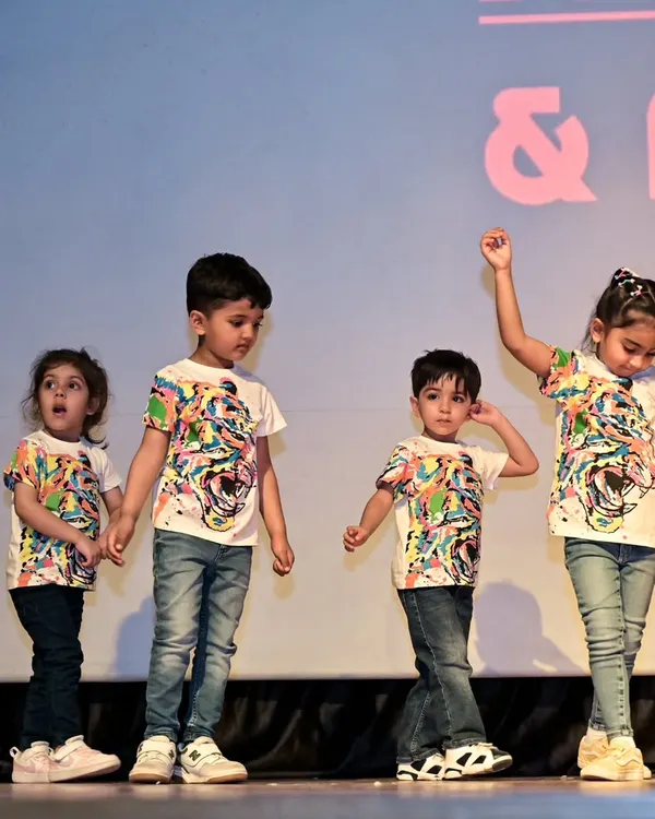 Here is our toddler group in their matching tiger-print shirts, ready for their first stage performance. I always choose fun costumes and themes to make the experience exciting for the little ones.