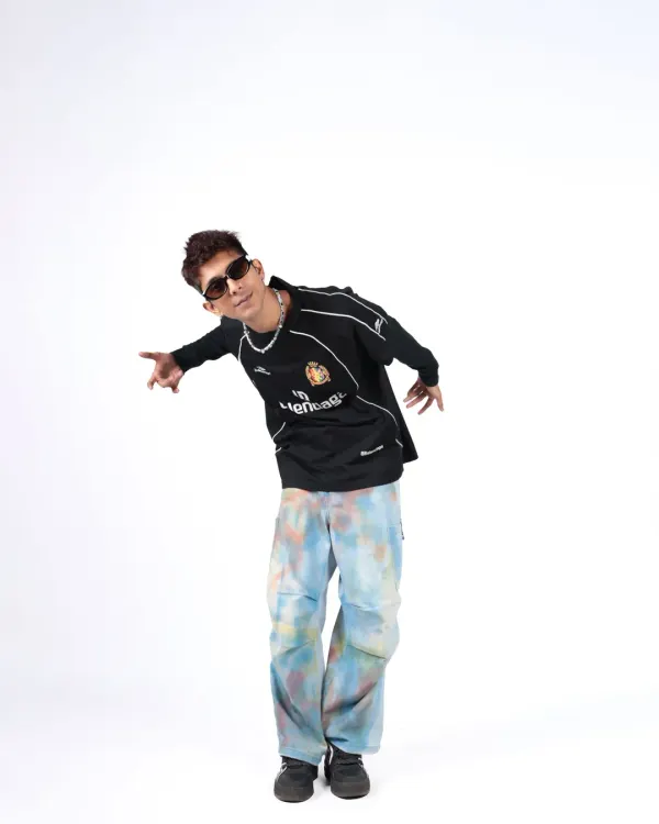 Walking like I talk it. This full-length shot captures the hip-hop attitude, with a cool pose and an outfit that's ready for the streets of Mumbai.