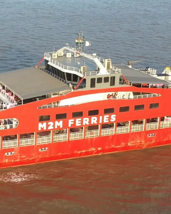 We turned an M2M ferry into a floating wedding venue. This shot captures the grandeur and uniqueness of hosting a celebration on the open water, an idea we brought to life for our adventurous couple.