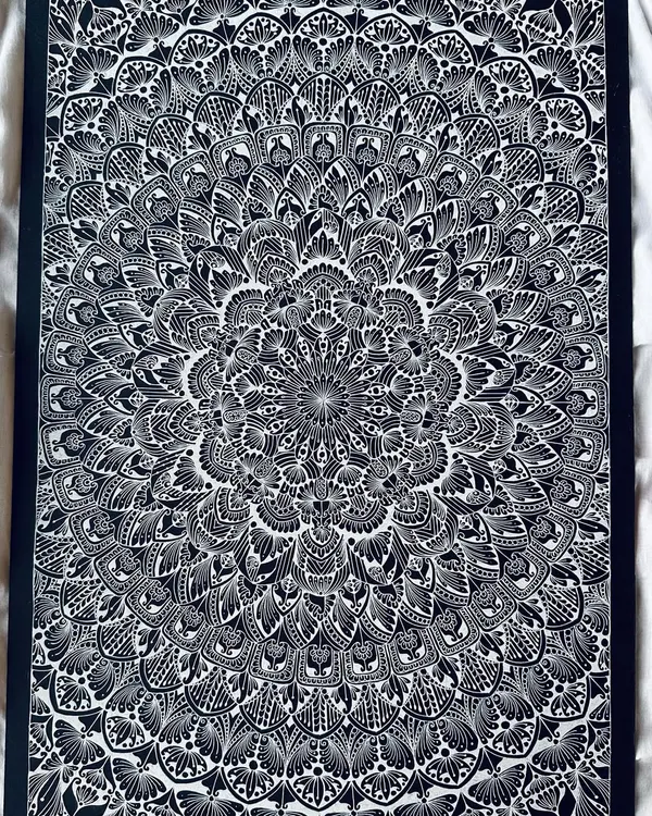A close-up look at the details of a large, intricate piece. Every line and dot is placed with intention. This kind of detailed work is a deep form of meditation for me.